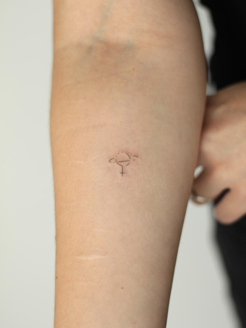 Fine line feminist tattoo by queer artist in lisbon