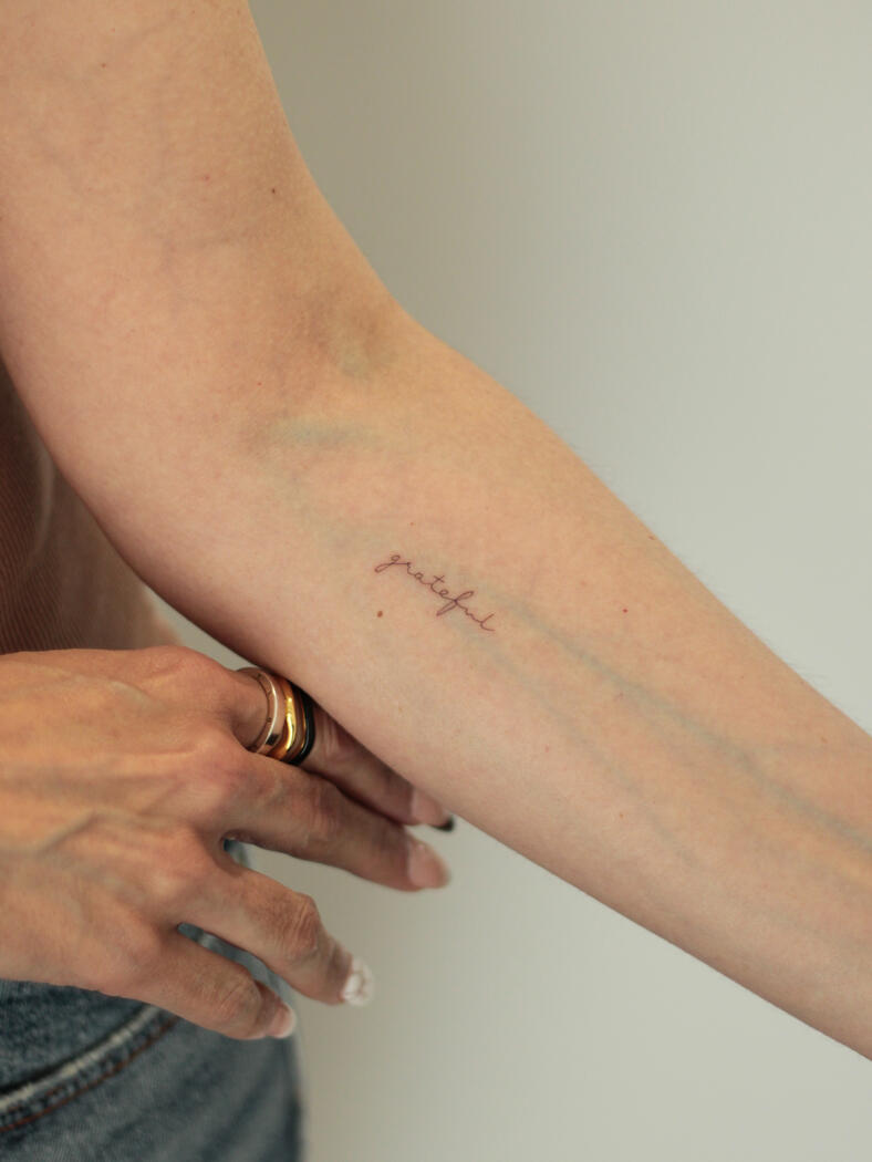 Fine line small tattoo by queer artist in lisbon